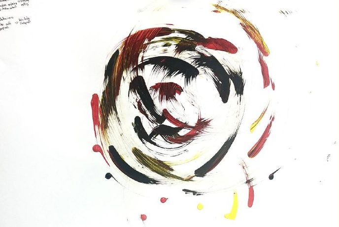 Painted circular strokes in black, red and yellow